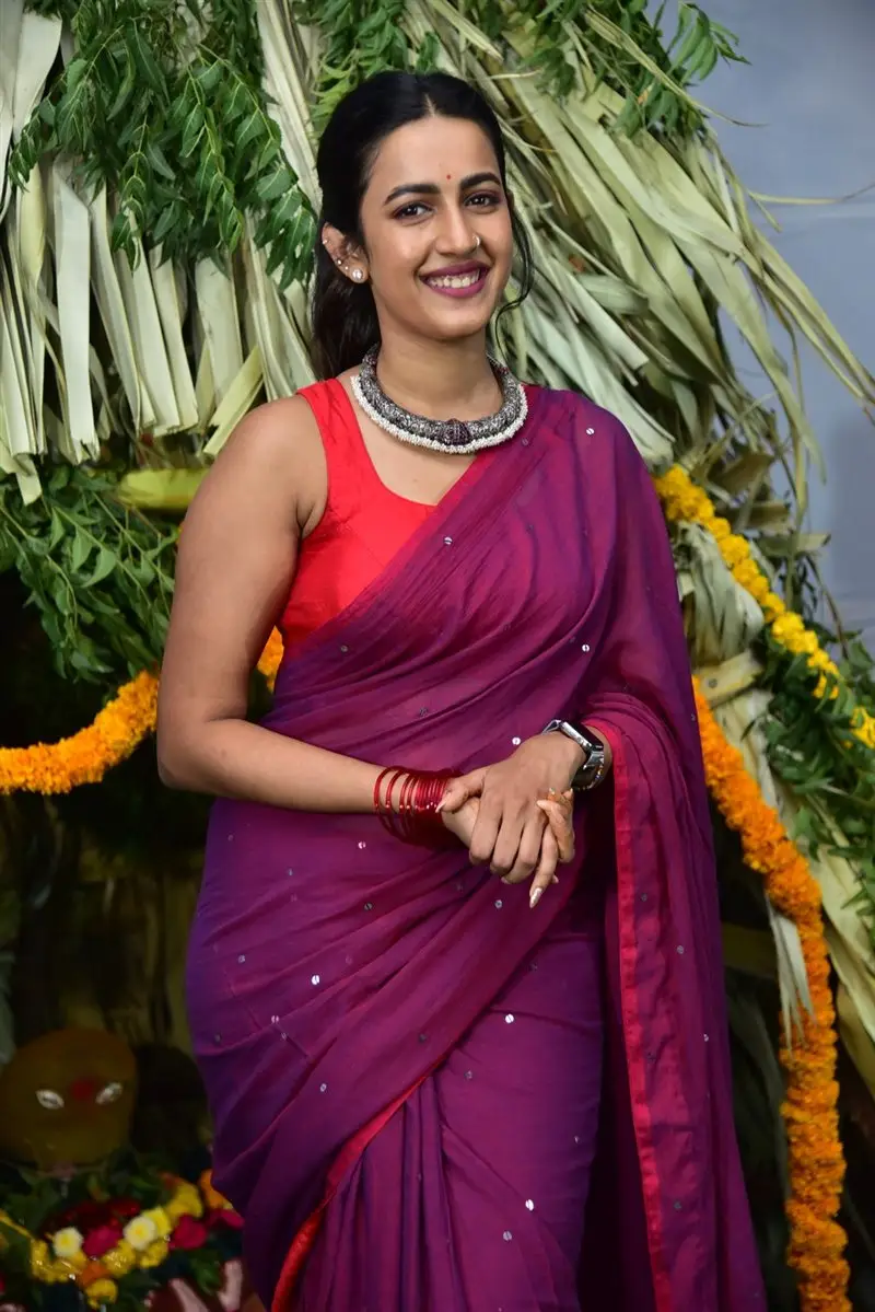 Niharika Konidela Stills in Violet Saree Sleeveless Orange Blouse